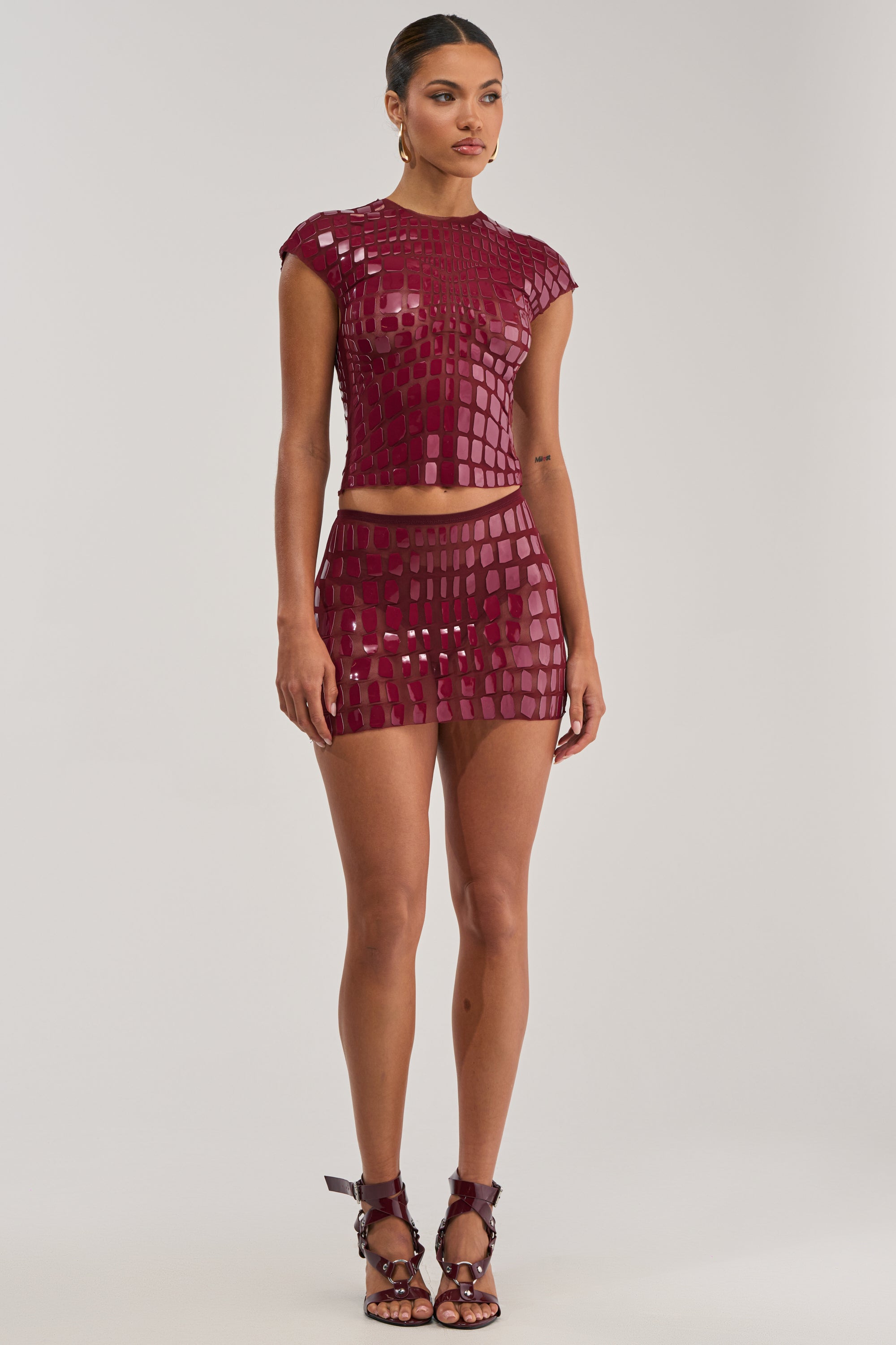 SEE THROUGH ME MINI SKIRT IN BURGUNDY