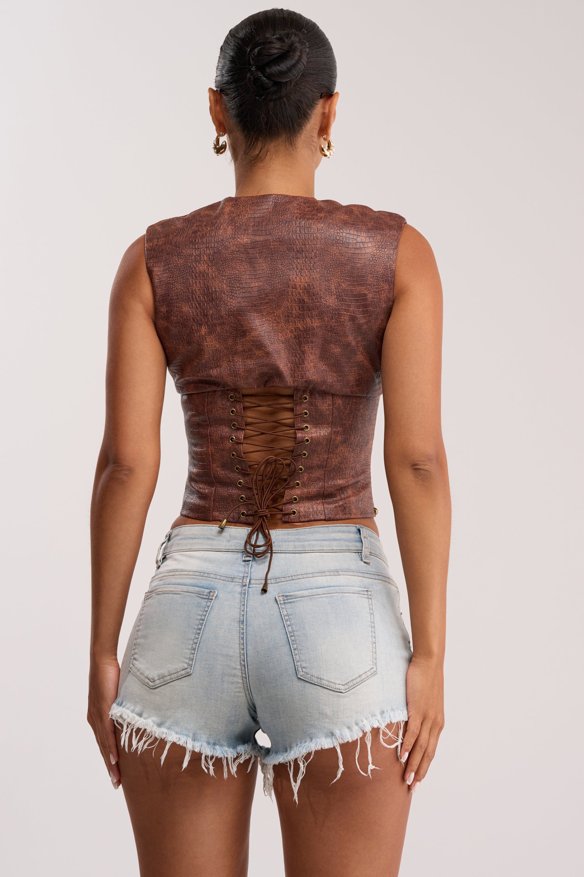 DOWN FOR WHATEVER FAUX LEATHER CORSET TOP