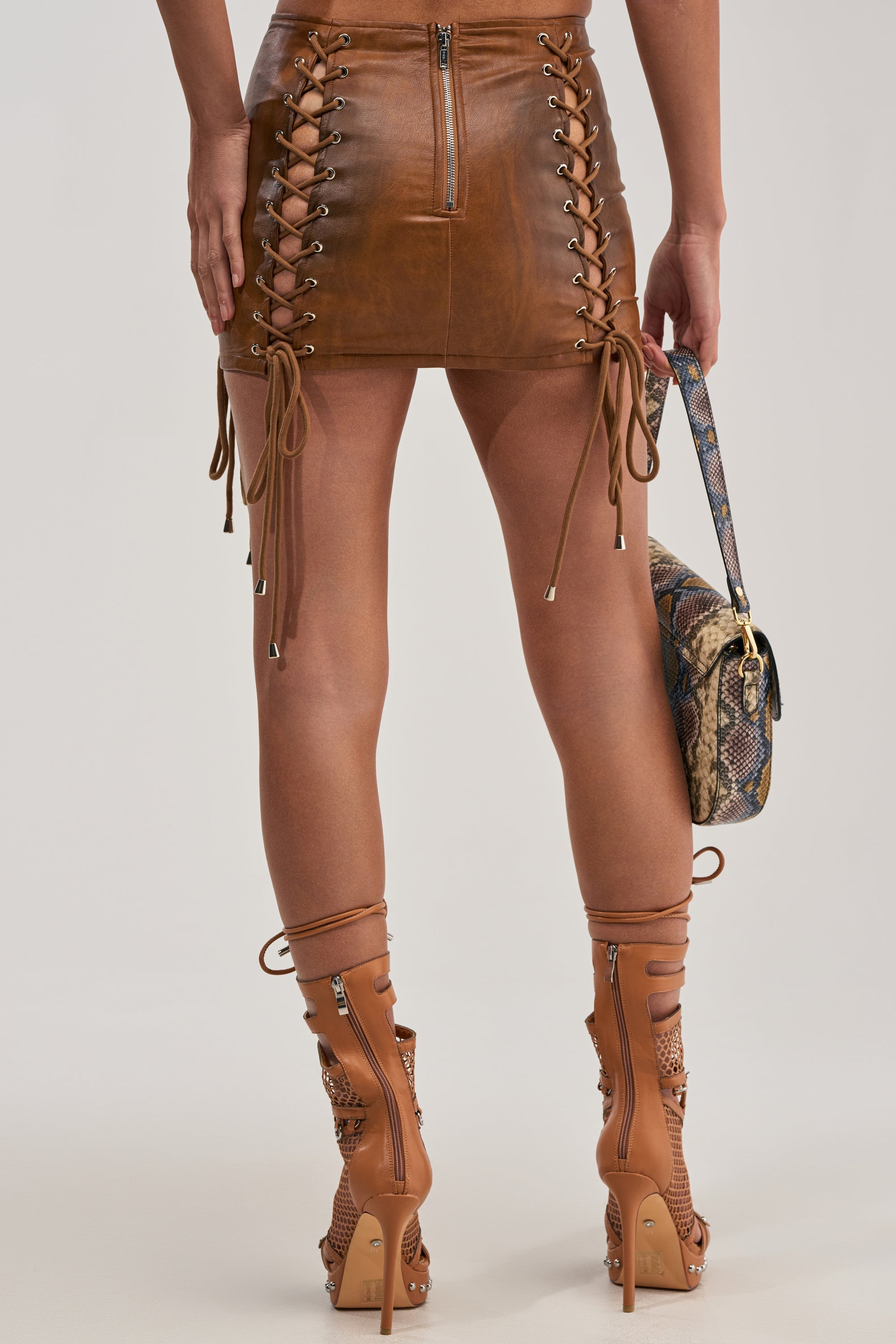 LOCK ME UP LACE UP MINI SKIRT