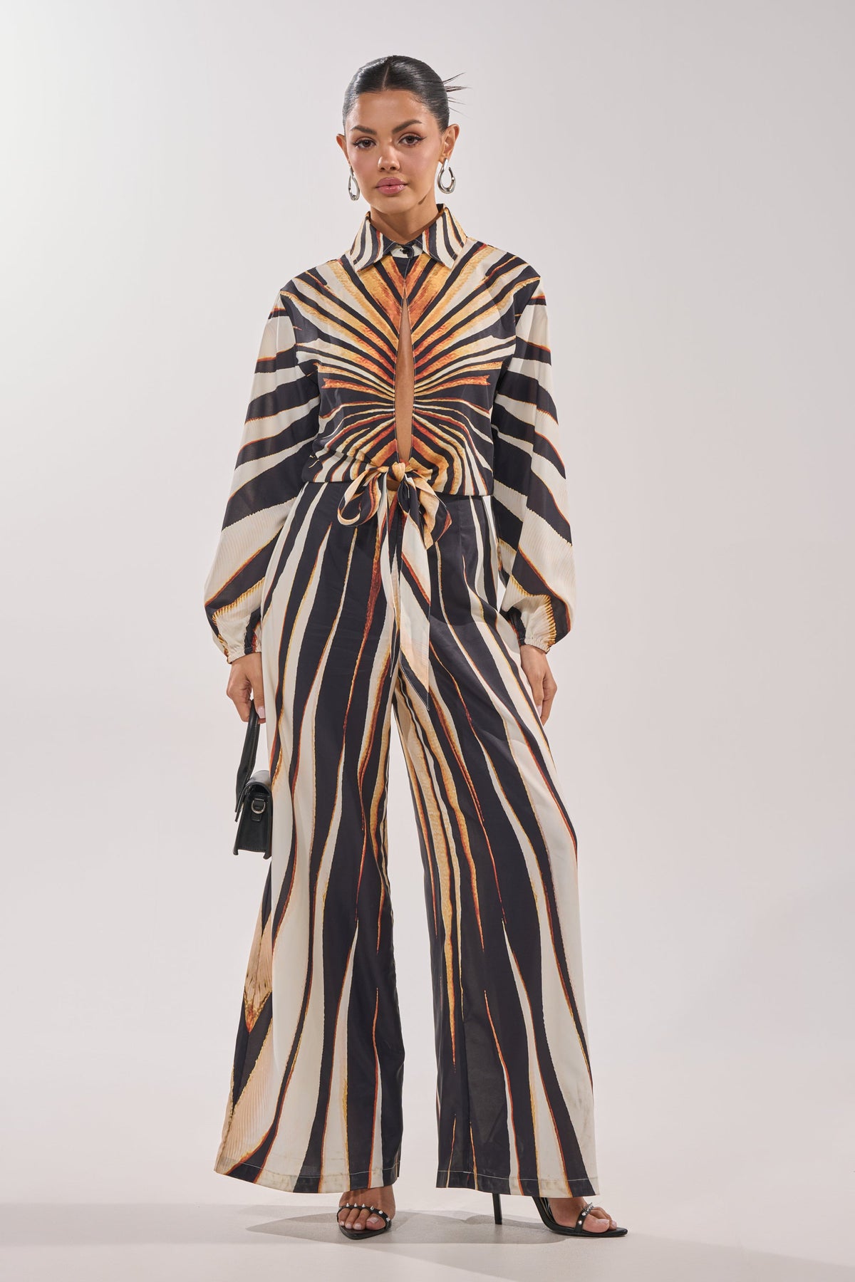 FIERCE INSTINCTS LONG SLEEVE JUMPSUIT