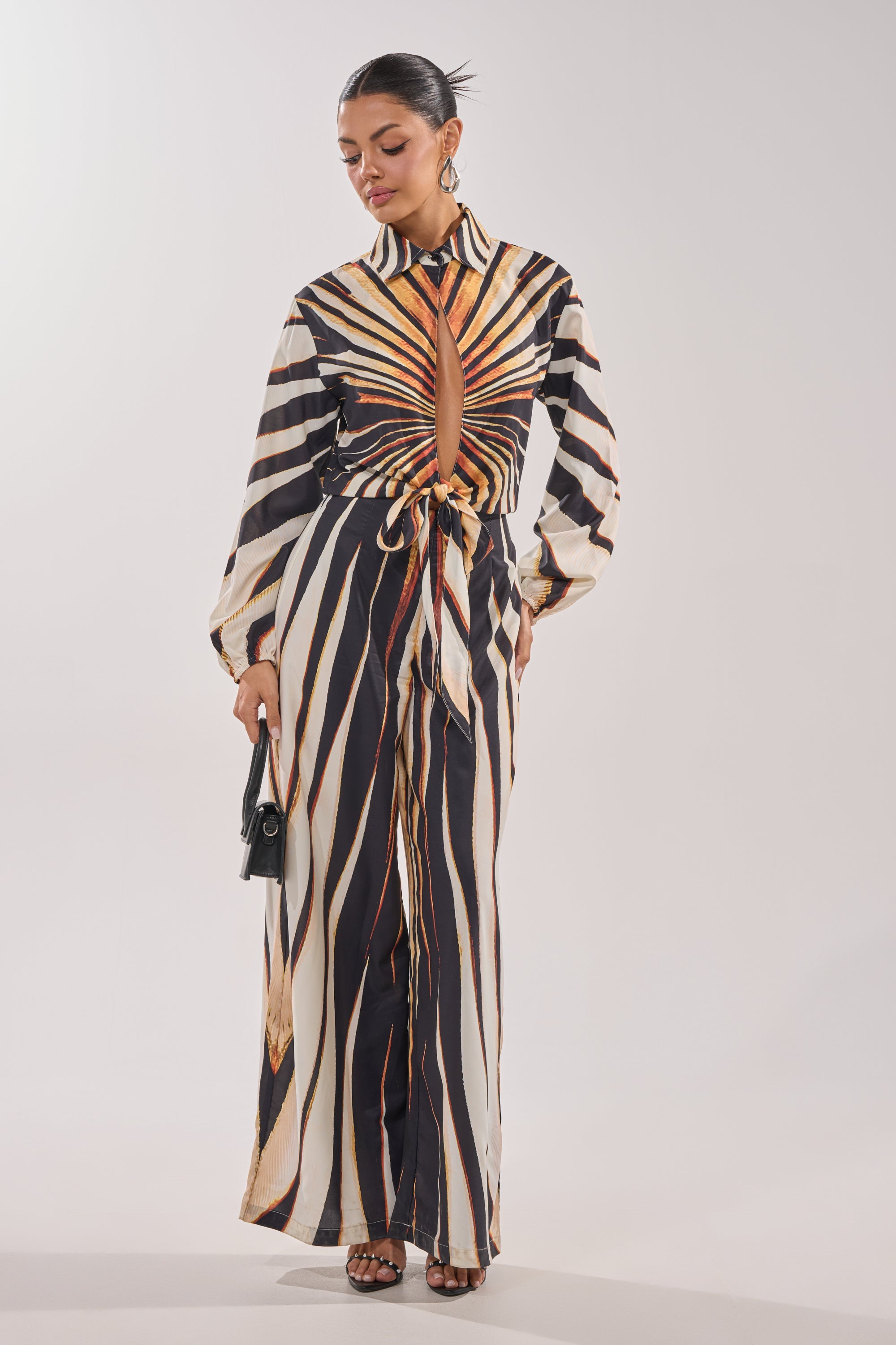 FIERCE INSTINCTS LONG SLEEVE JUMPSUIT