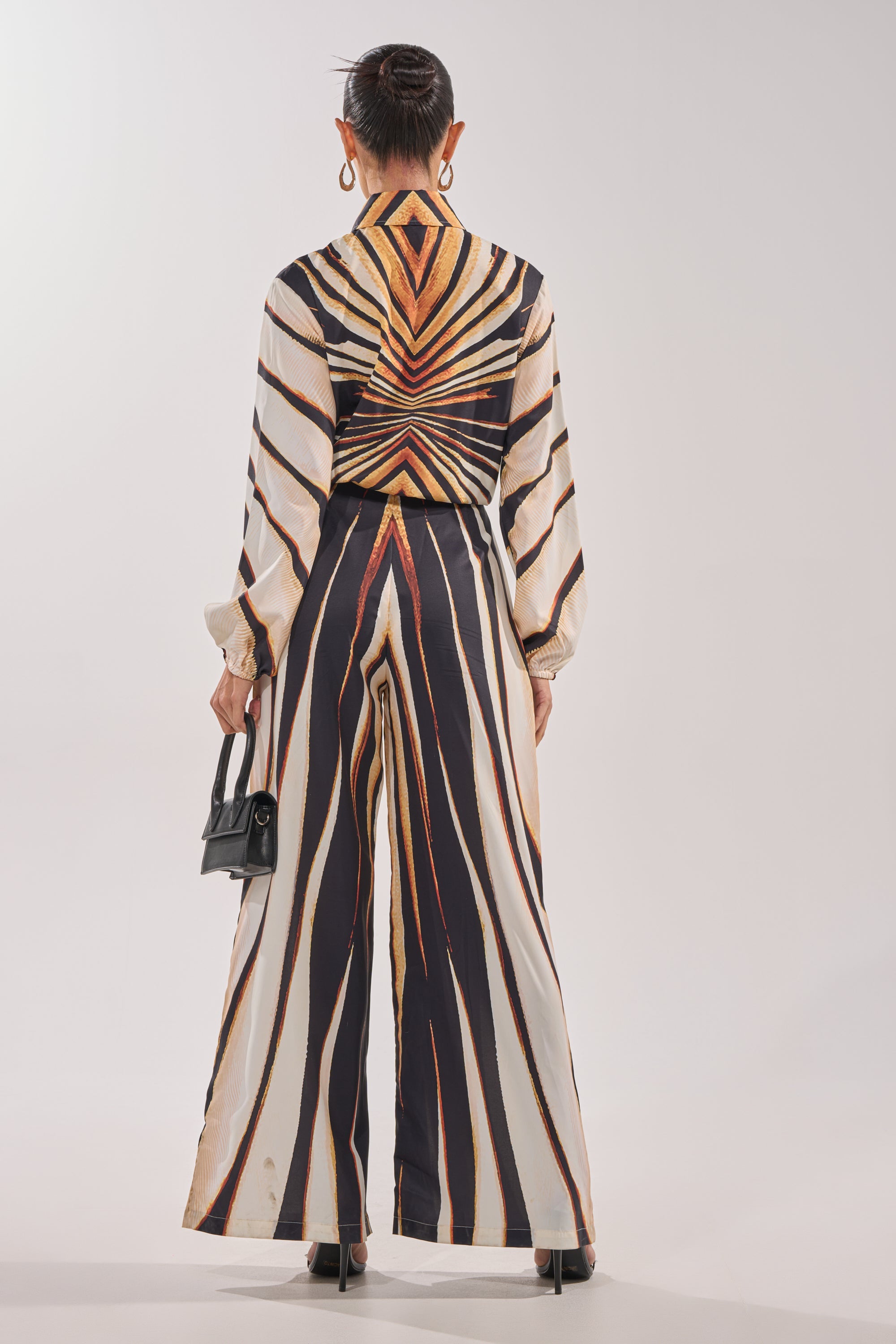 FIERCE INSTINCTS LONG SLEEVE JUMPSUIT