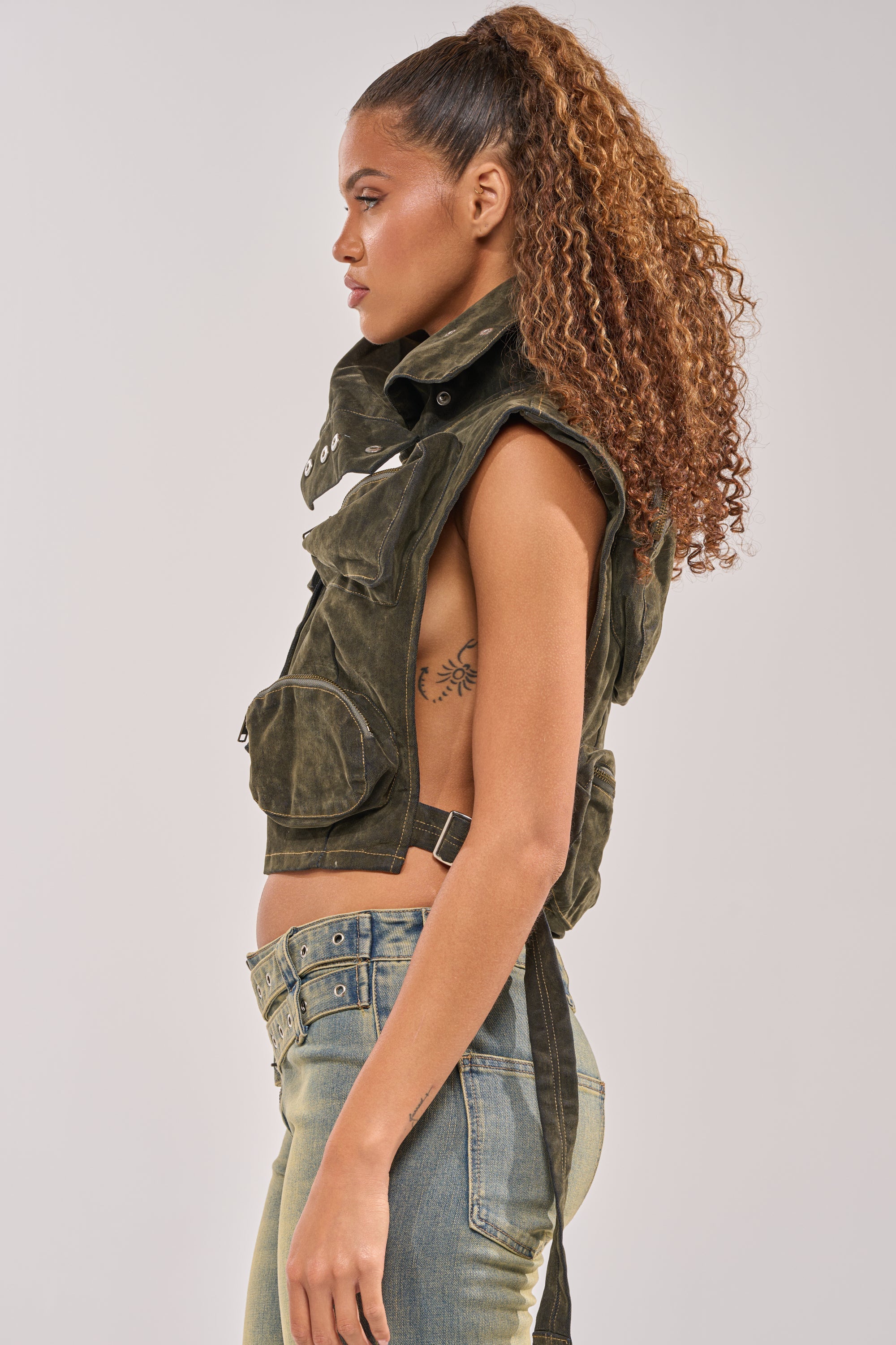 MODEL BEHAVIOR TOP IN DARK OLIVE DENIM