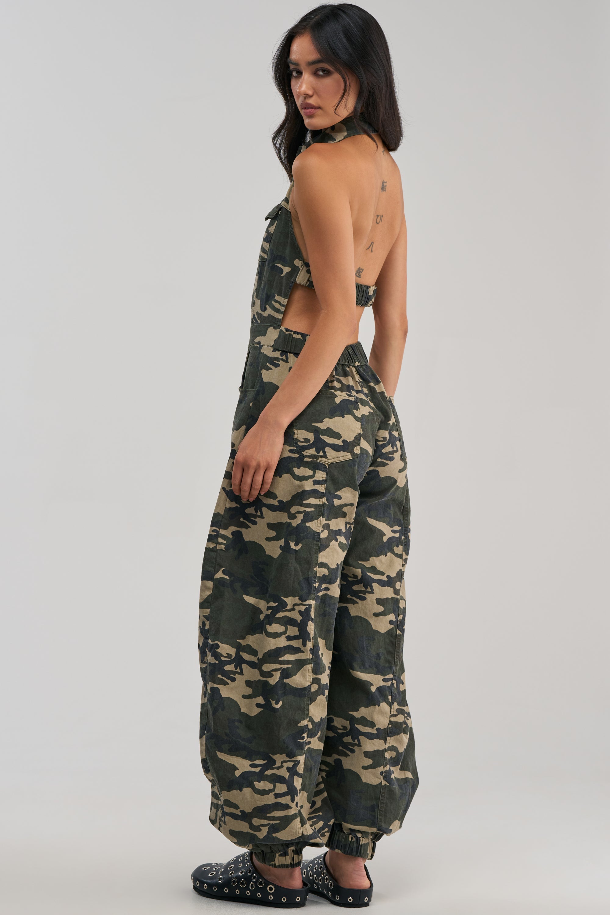 COUNT ME IN CAMO HALTER JUMPSUIT