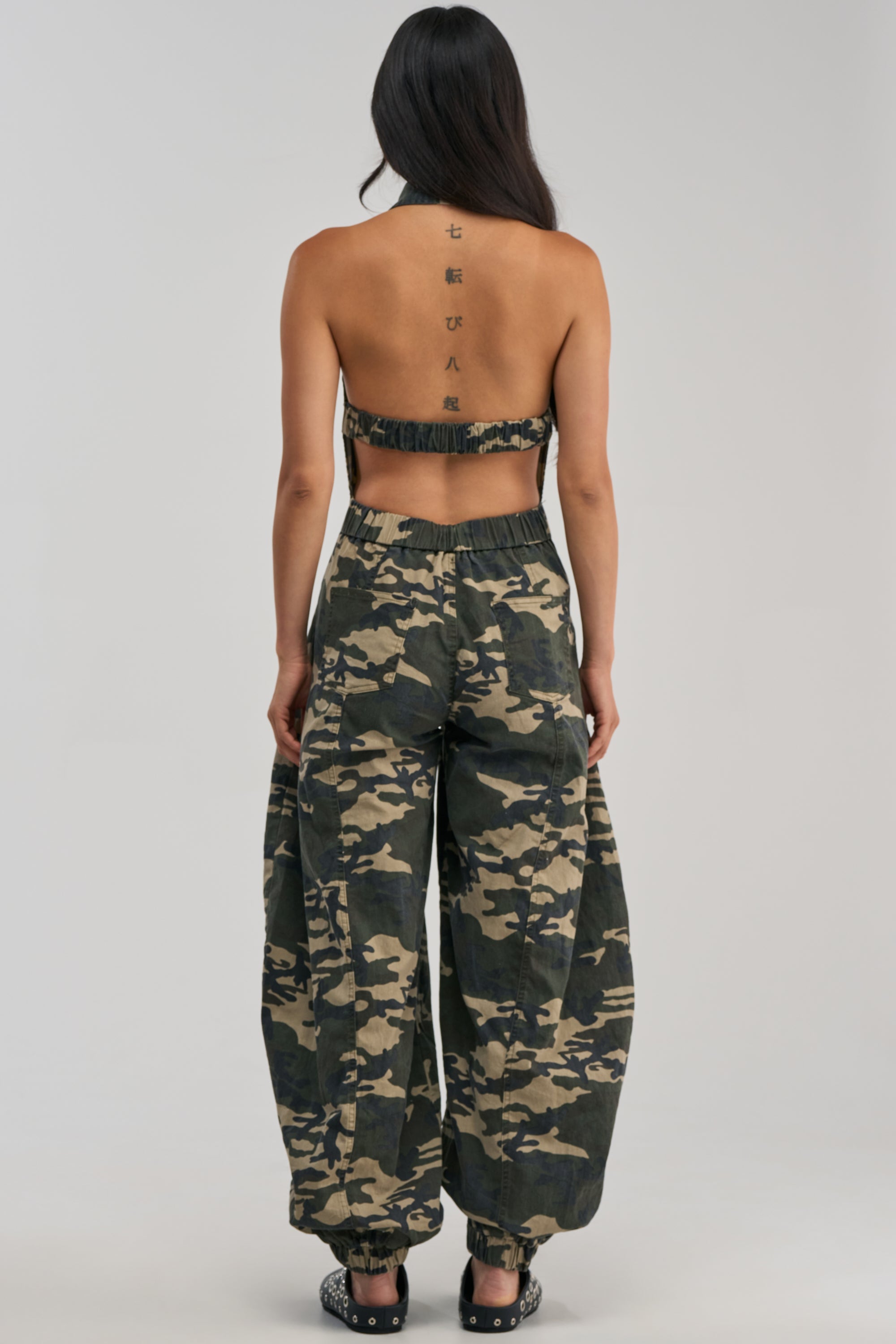 COUNT ME IN CAMO HALTER JUMPSUIT