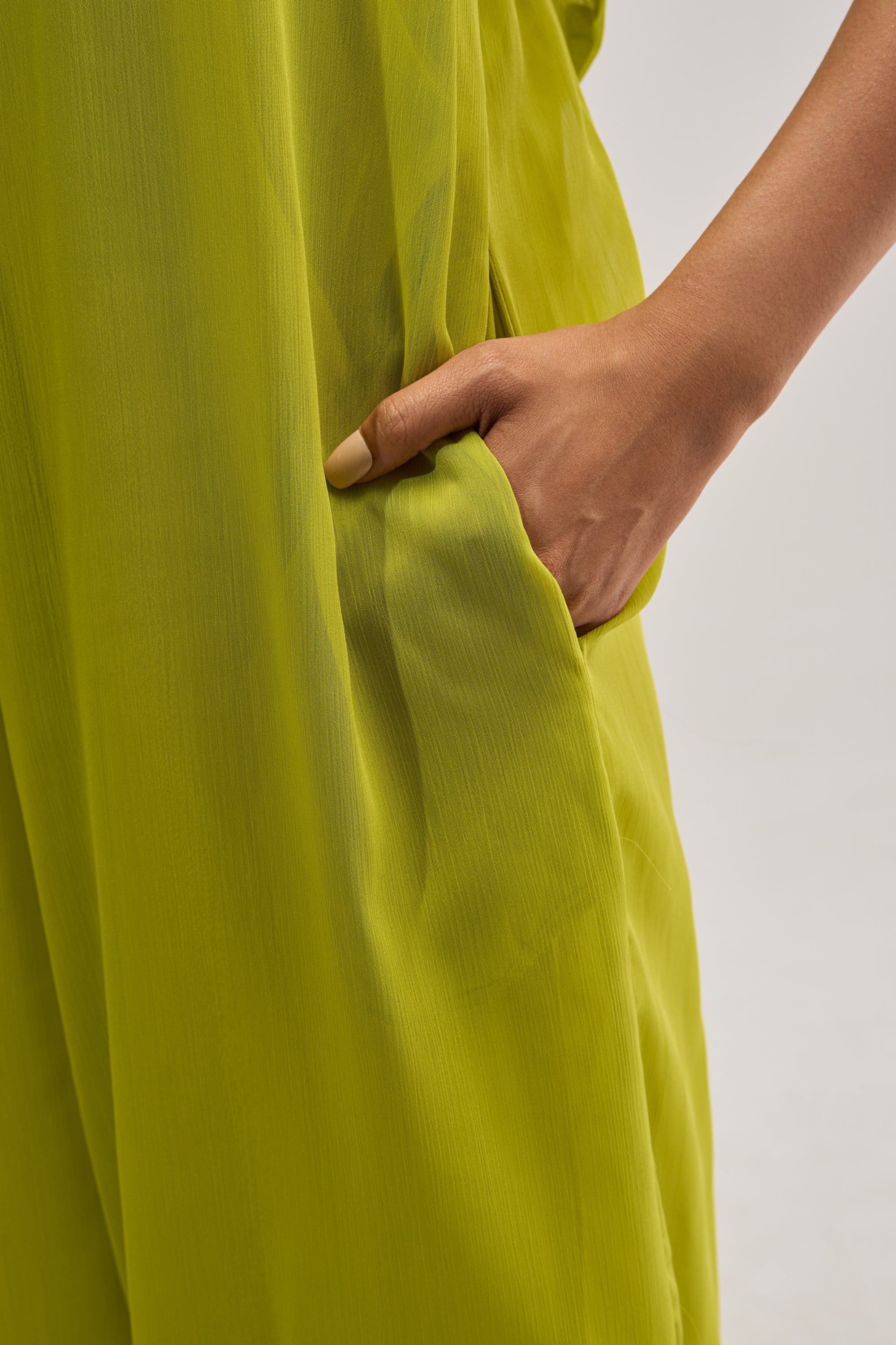 PLUS ONE CHIFFON JUMPSUIT IN CHARTRUESE