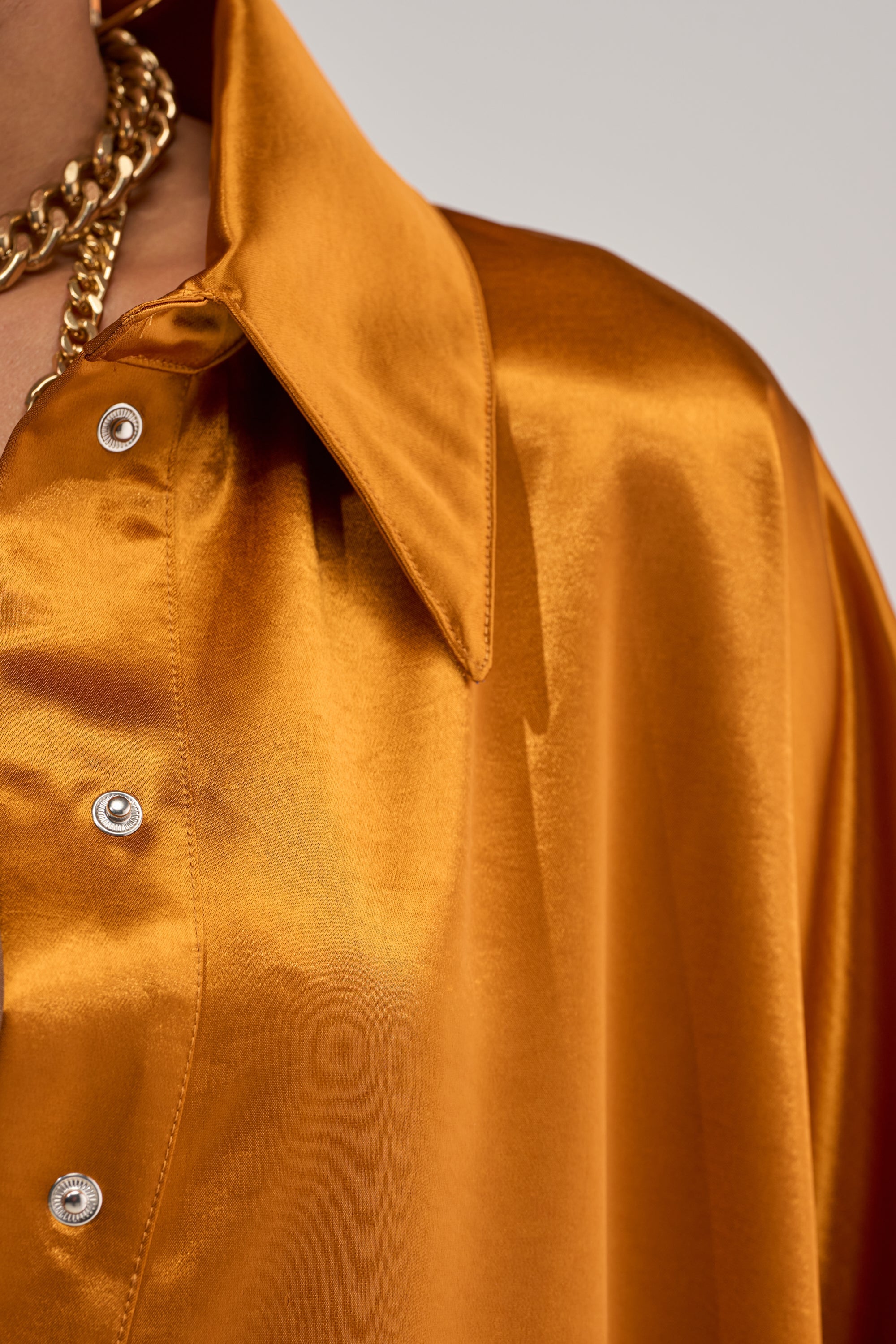 SHE'S RICH OVERSIZED SATIN ROMPER IN MUSTARD