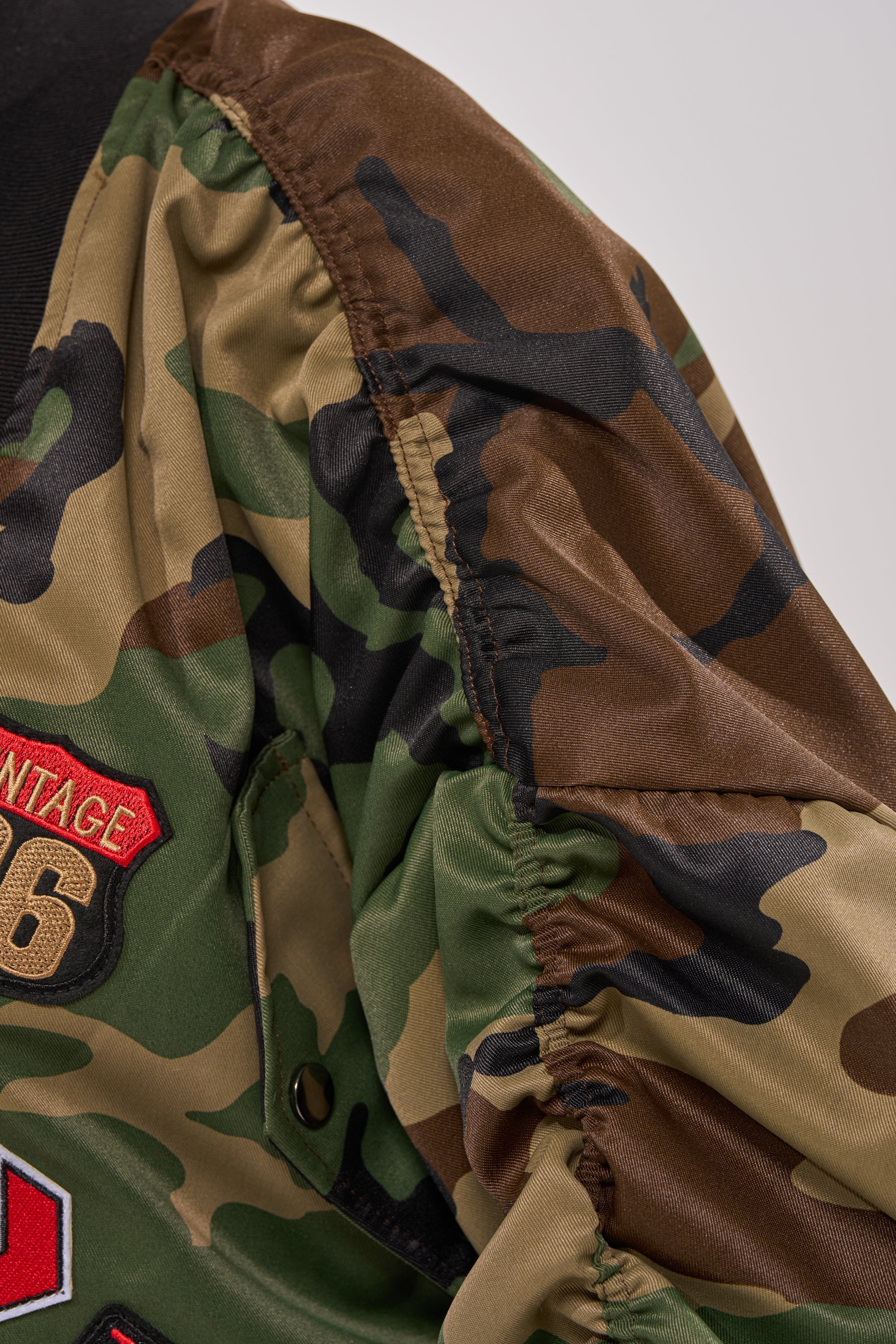 ON THE RUN CAMO BOMBER