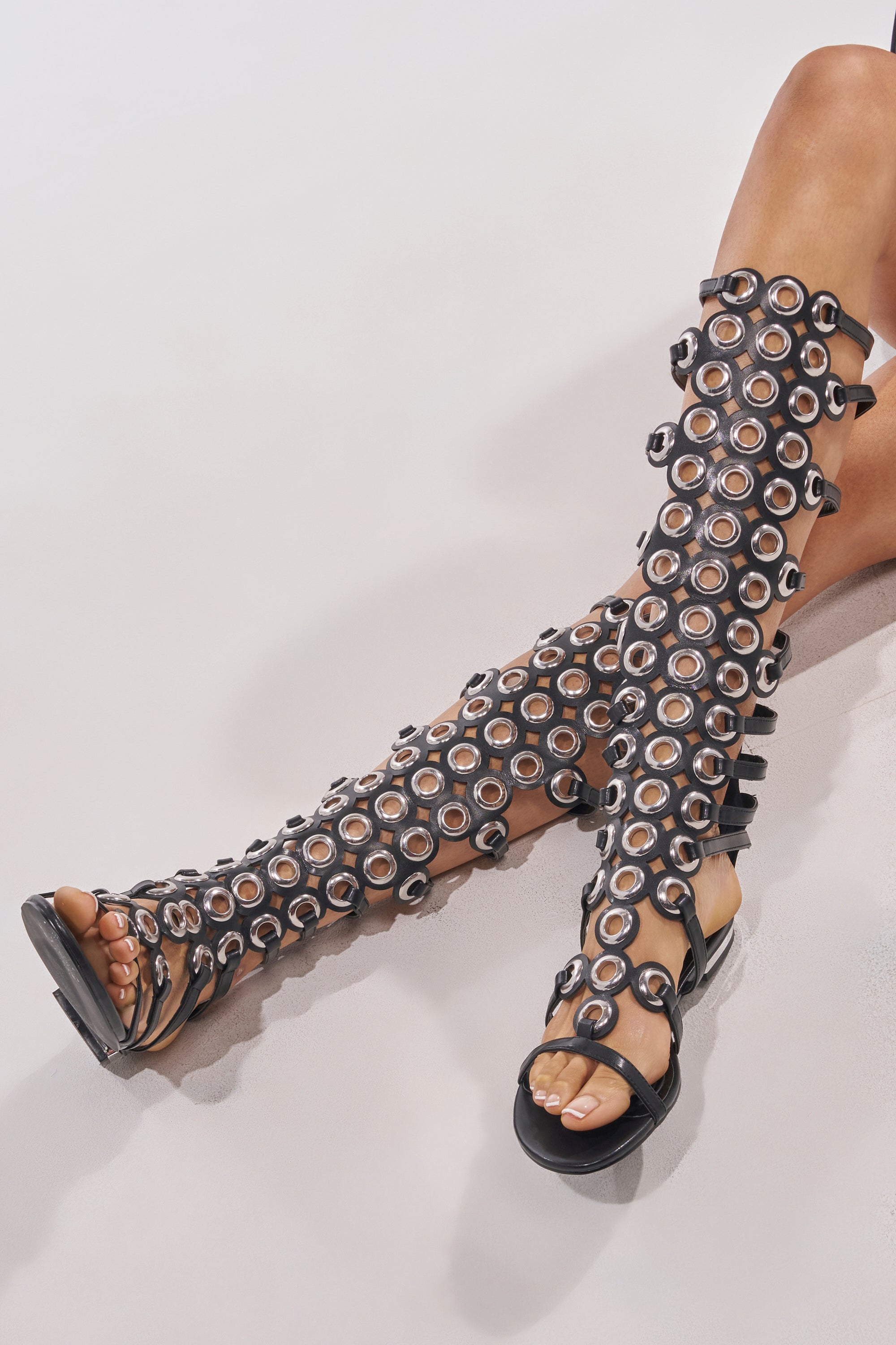 AZALEA WANG LUCE BLACK GROMMET DETAIL FLAT GLADIATOR SANDAL