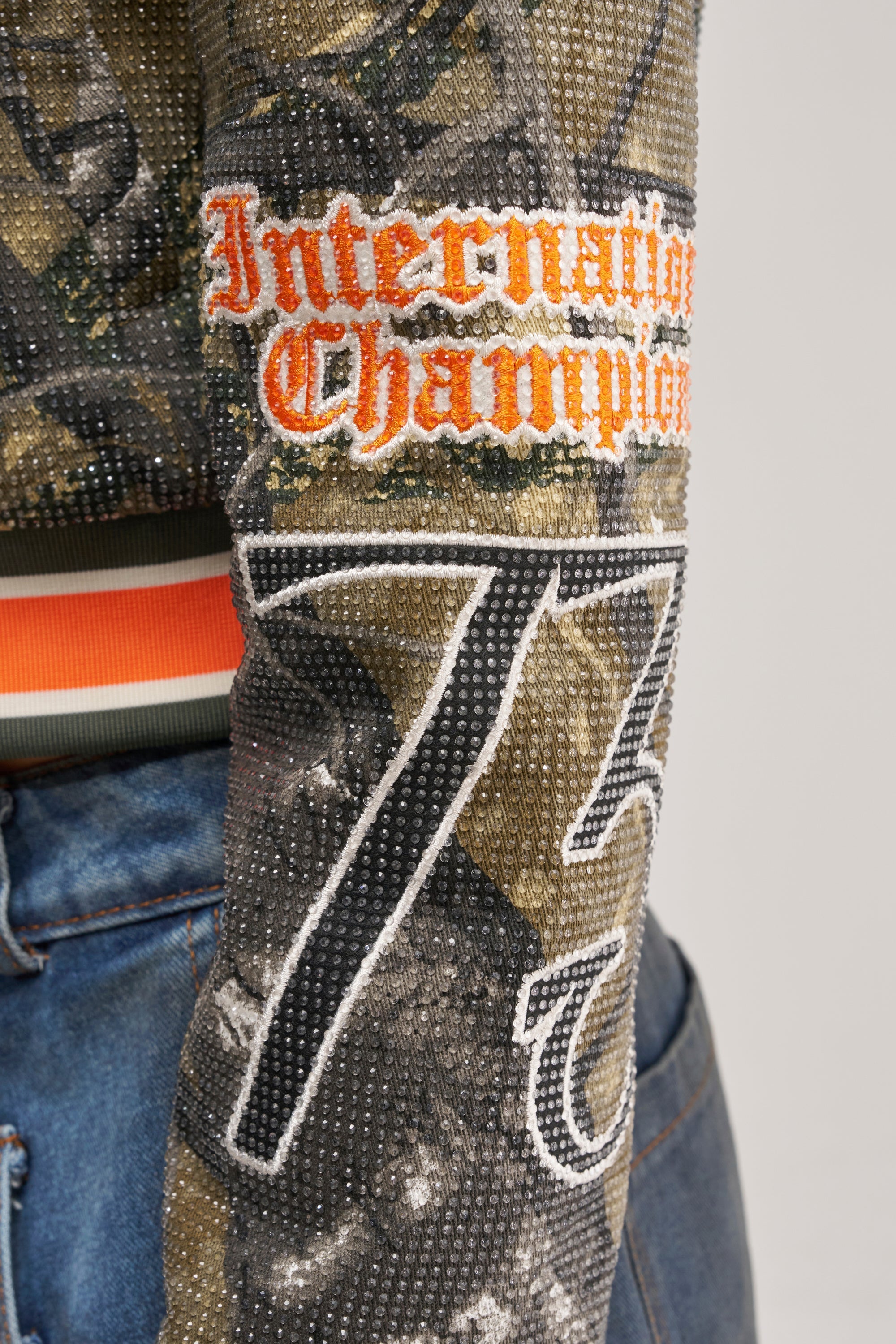 TAPPED IN RHINESTONE BOMBER