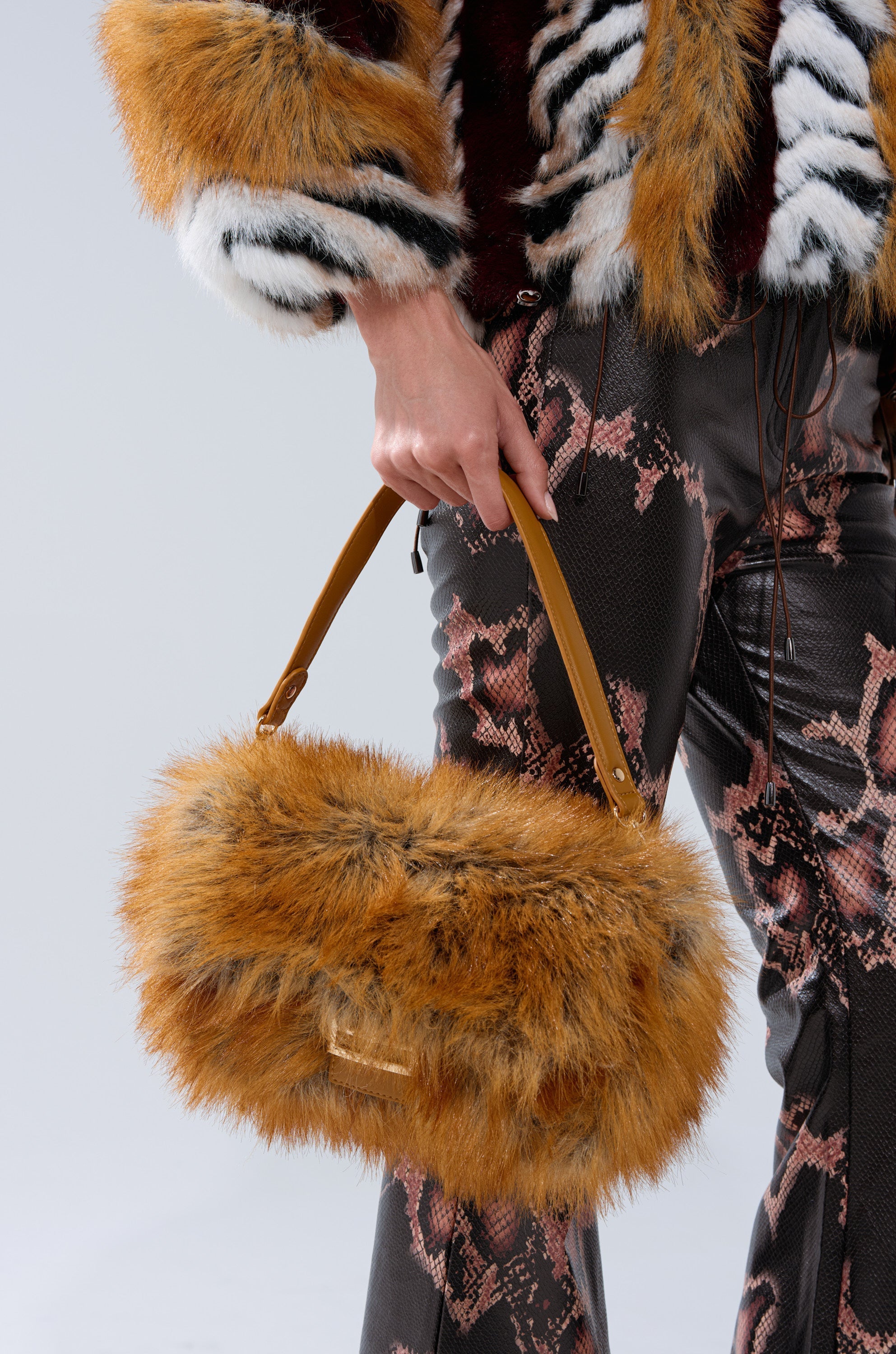 REALLY LIKE THAT FAUX FUR PURSE