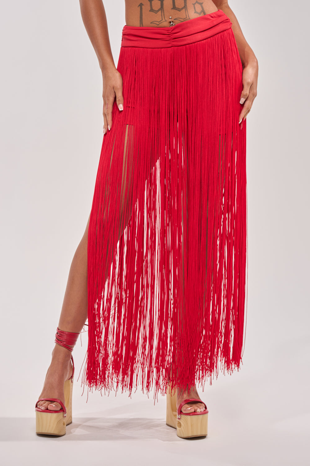 ON THE EDGE FRINGE SKIRT