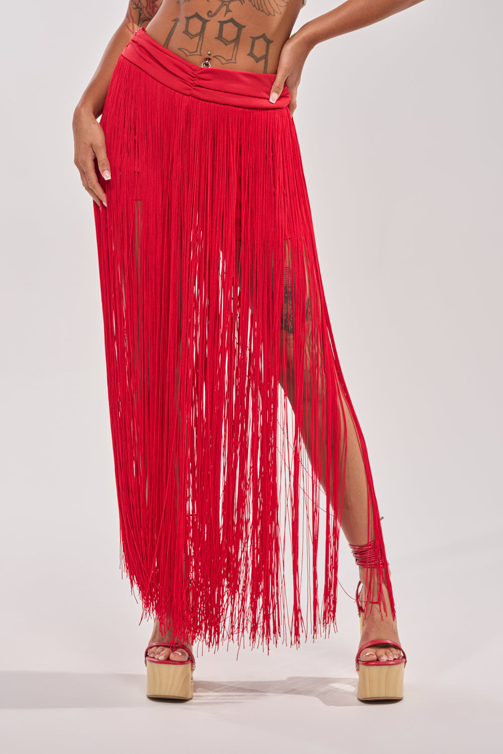 ON THE EDGE FRINGE SKIRT