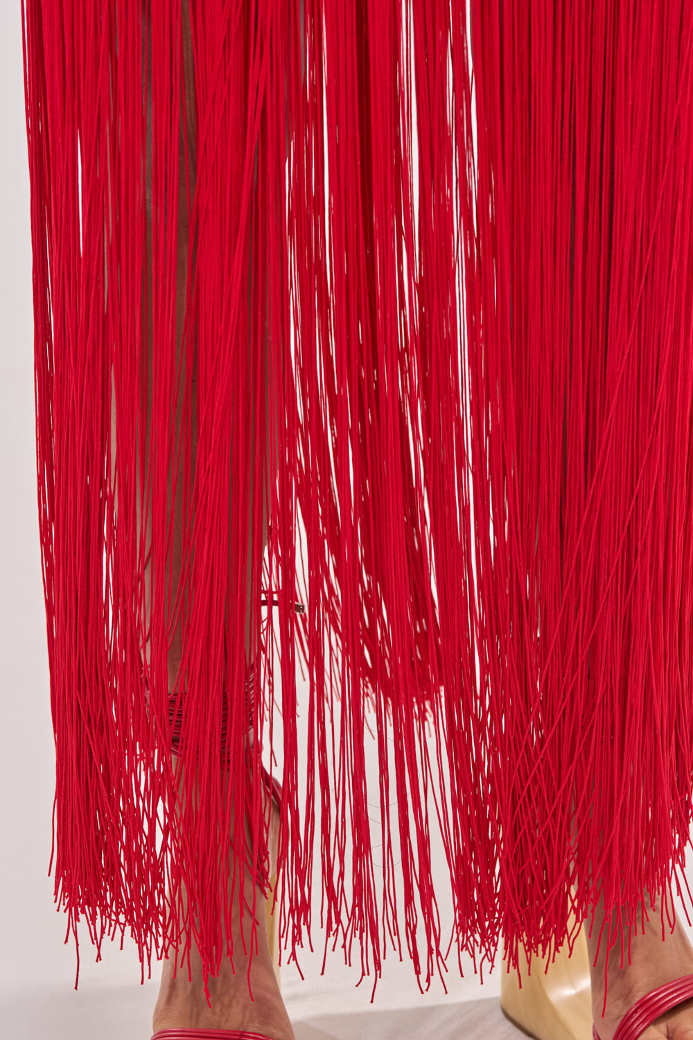 ON THE EDGE FRINGE SKIRT