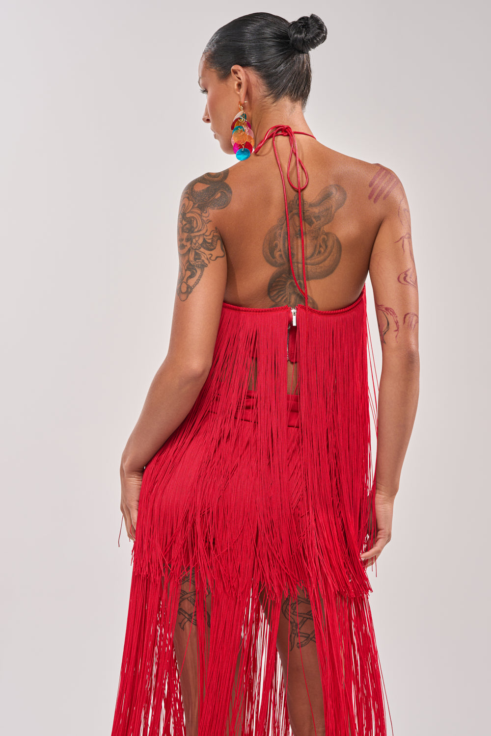 ON THE EDGE FRINGE HALTER TOP