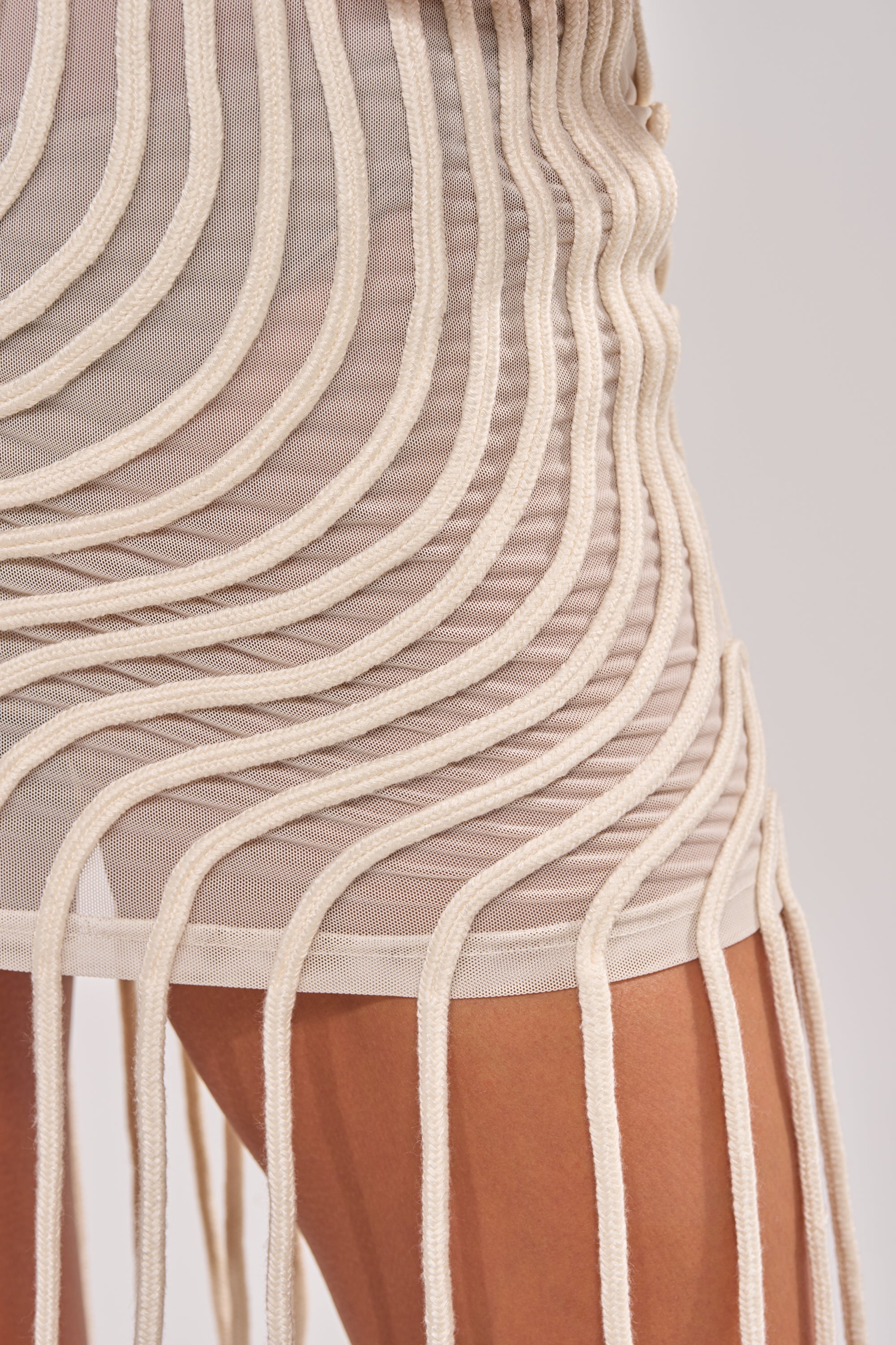 ILLUSIONS SLEEVELESS MINI DRESS IN BONE