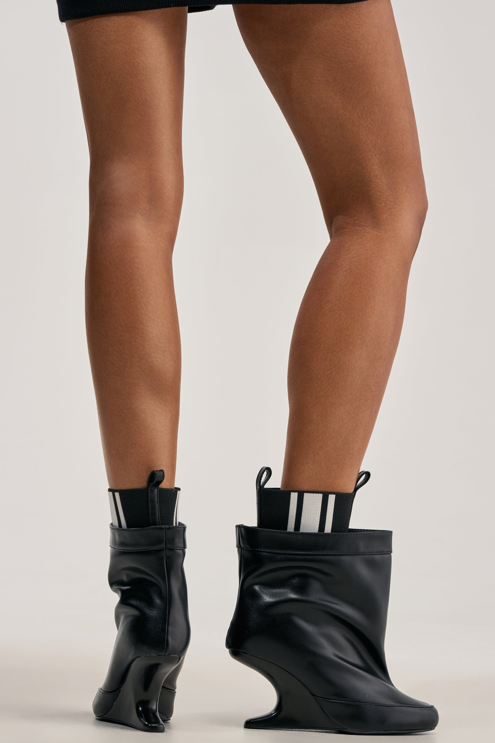 AKIRA GOLD ZAVI BLACK WEDGE BOOTIE