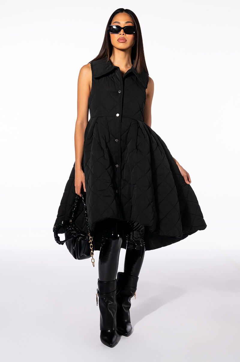 STEPPING OUT QUILTED PEPLUM VEST