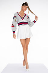 PATCHES ON PATCHES SWEATER