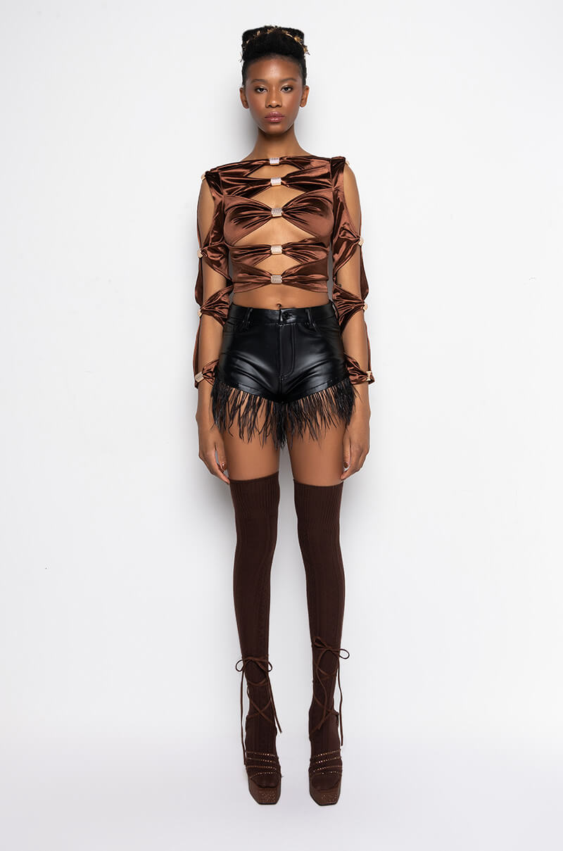 TOO COCKY FEATHER TRIM FAUX LEATHER SHORTS